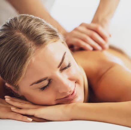 Professional,Masseur,Doing,Therapeutic,Massage.,Woman,Enjoying,Massage,In,Her